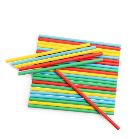 Moulin Roty classic colorful wooden pick up sticks game on a white background.