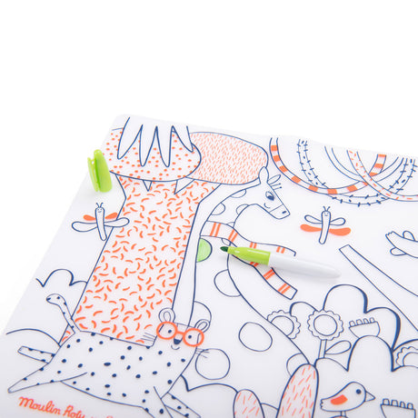 Moulin Roty silicone coloring mat featuring Les Toupitis animals and a green marker.