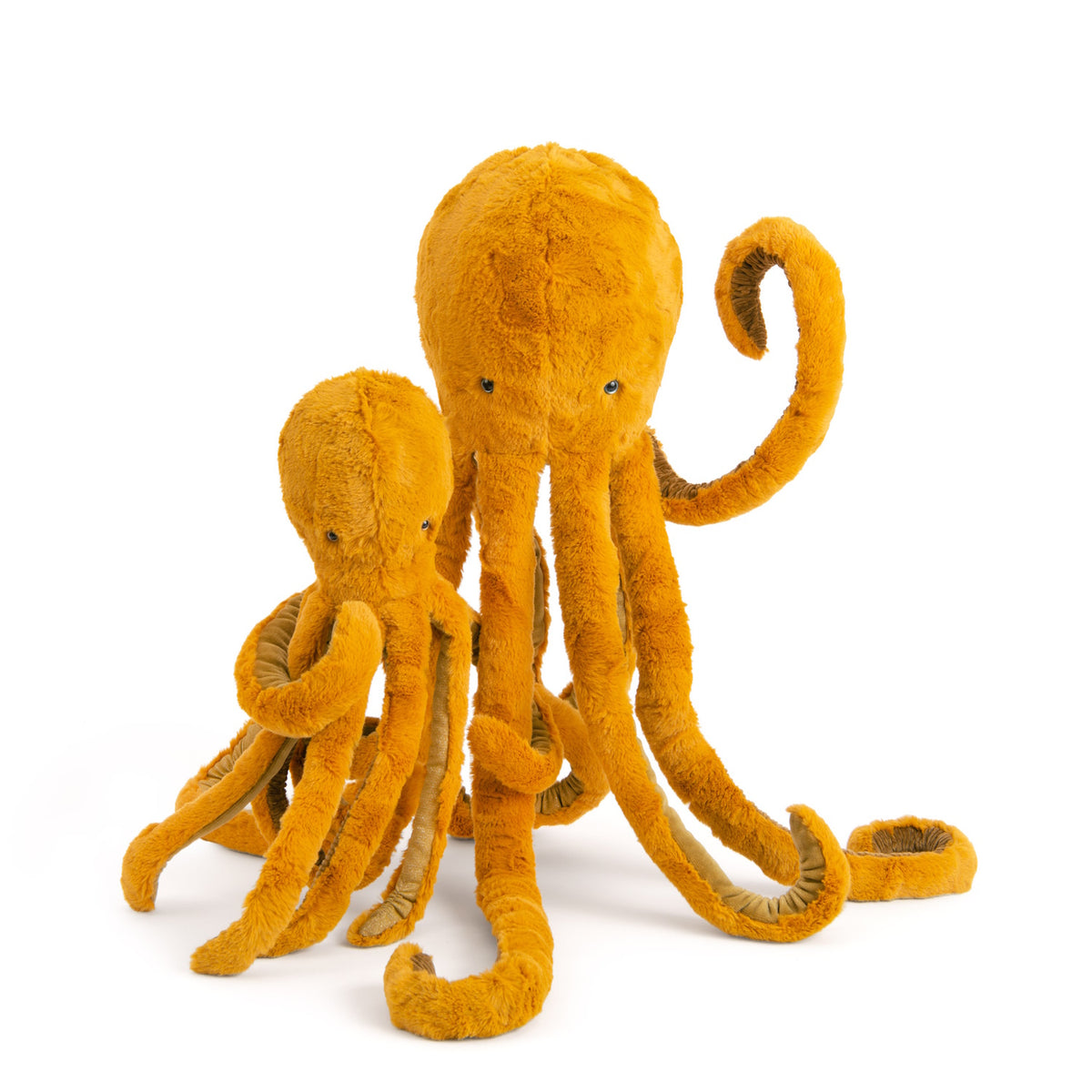Two ochre yellow plush octopus stuffed animals by Moulin Roty, featuring soft textured fur and long curled tentacles.