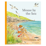 Book cover for "Mouse by the Sea" featuring a mouse building a sandcastle on a grassy beach with flying gulls.