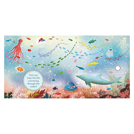 Undersea illustration from Carnival of the Animals children's book featuring a dolphin, octopus, and schools of colorful fish.
