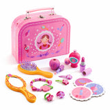 Djeco pink wooden vanity case play set with toy makeup, hairbrush, mirror, and jewelry for kids.