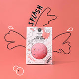 Colorful image of a pink kids' Galaxy Bath Bomb box against a matching background with comic-style splashes and playful text like "SPLASH" and "WOW!"