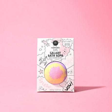 Nailmatic Kids Galaxy Bath Bomb box displaying product through cutout, on pink background.