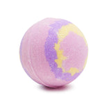 Round pink, purple, and yellow swirled bath bomb on a plain white background.