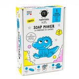 Box of Nailmatic Kids Soap Maker kit for children, featuring a playful blue cartoon crocodile. Includes molding instructions and highlights natural ingredients.