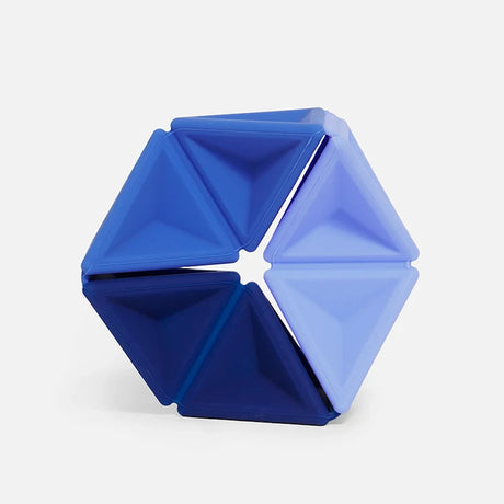 Hexagonal silicone fidget toy featuring triangular segments in three shades of blue.