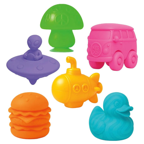 Colorful NeeDoh squishy fidget toys including a purple alien UFO, pink bus, yellow submarine, and orange burger.
