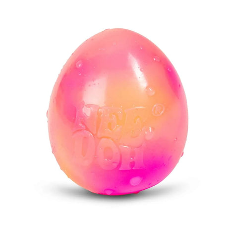 Colorful stress ball with embossed "NEE DOH," blending pink and orange hues. Its smooth, shiny surface is dotted with small droplets, conveying a playful, tactile appeal.