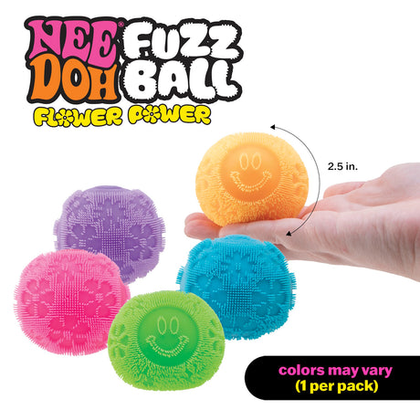 Colorful Nee Doh Fuzz Balls in orange, purple, blue, pink, and green with smiley faces. Text reads "Flower Power, colors may vary." A hand holds a 2.5-inch ball.