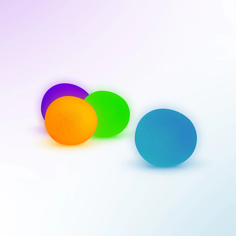 Bright, multicolored balls in orange, purple, green, and blue are scattered on a smooth, light background, conveying a playful and vibrant tone.