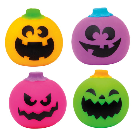 Four colorful NeeDoh Jack-Glow Lantern stress balls in orange, purple, pink, and green with various jack-o'-lantern faces.