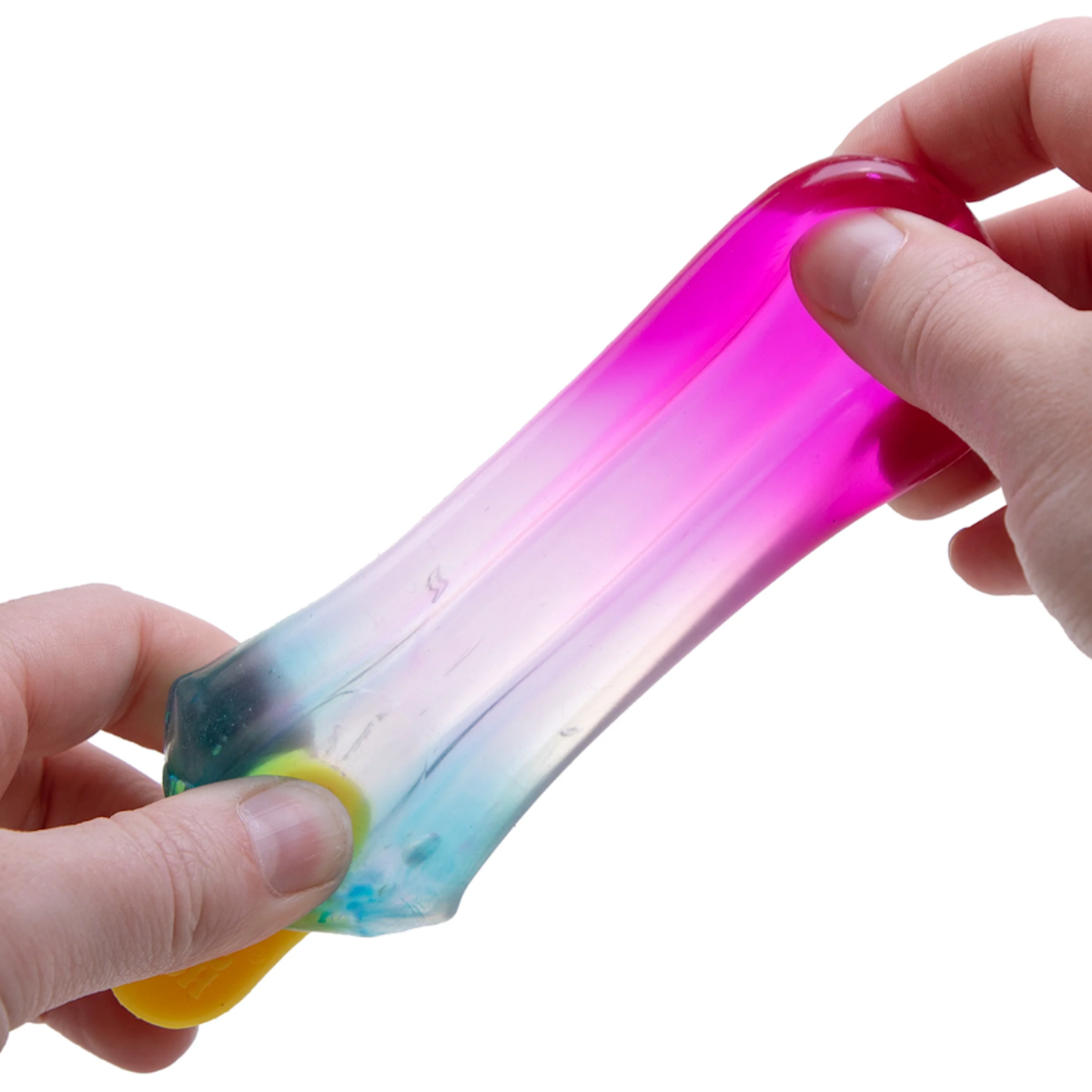 Hands stretching a pink and blue Schylling NeeDoh Nice-Icle popsicle-shaped fidget toy to show its squishy, flexible texture.