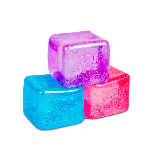 Three colorful, glittery NeeDoh Niceberg ice cube fidget toys in purple, blue, and pink stacked together.