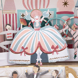 Close-up of Nutcracker theatre advent calendar featuring a ballerina paper puppet on stage.