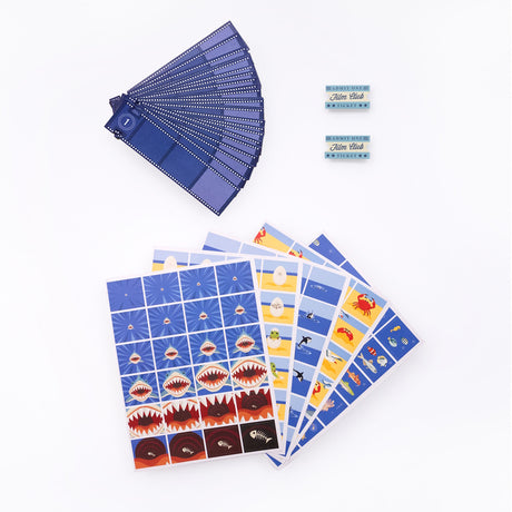 Ocean adventure flip book animation kit components including sea life sticker sheets and film strip cards on white background.