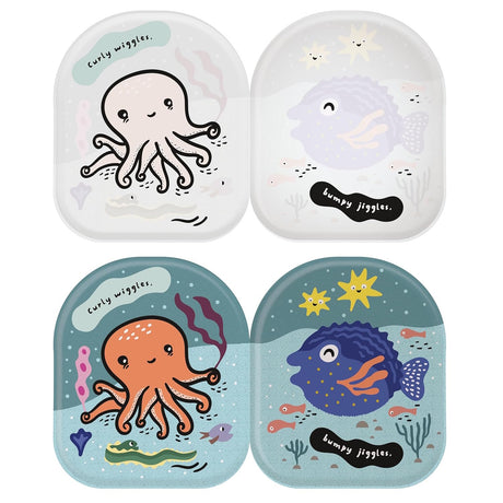 Inside pages of Wee Gallery bath book showing black and white sea creatures that change to color when wet.