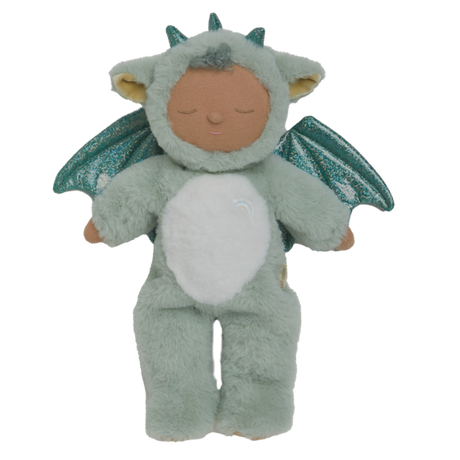 Plush baby doll in a green dragon onesie with sparkly wings and horns. The doll's eyes are closed, and it conveys a peaceful, sleepy expression.