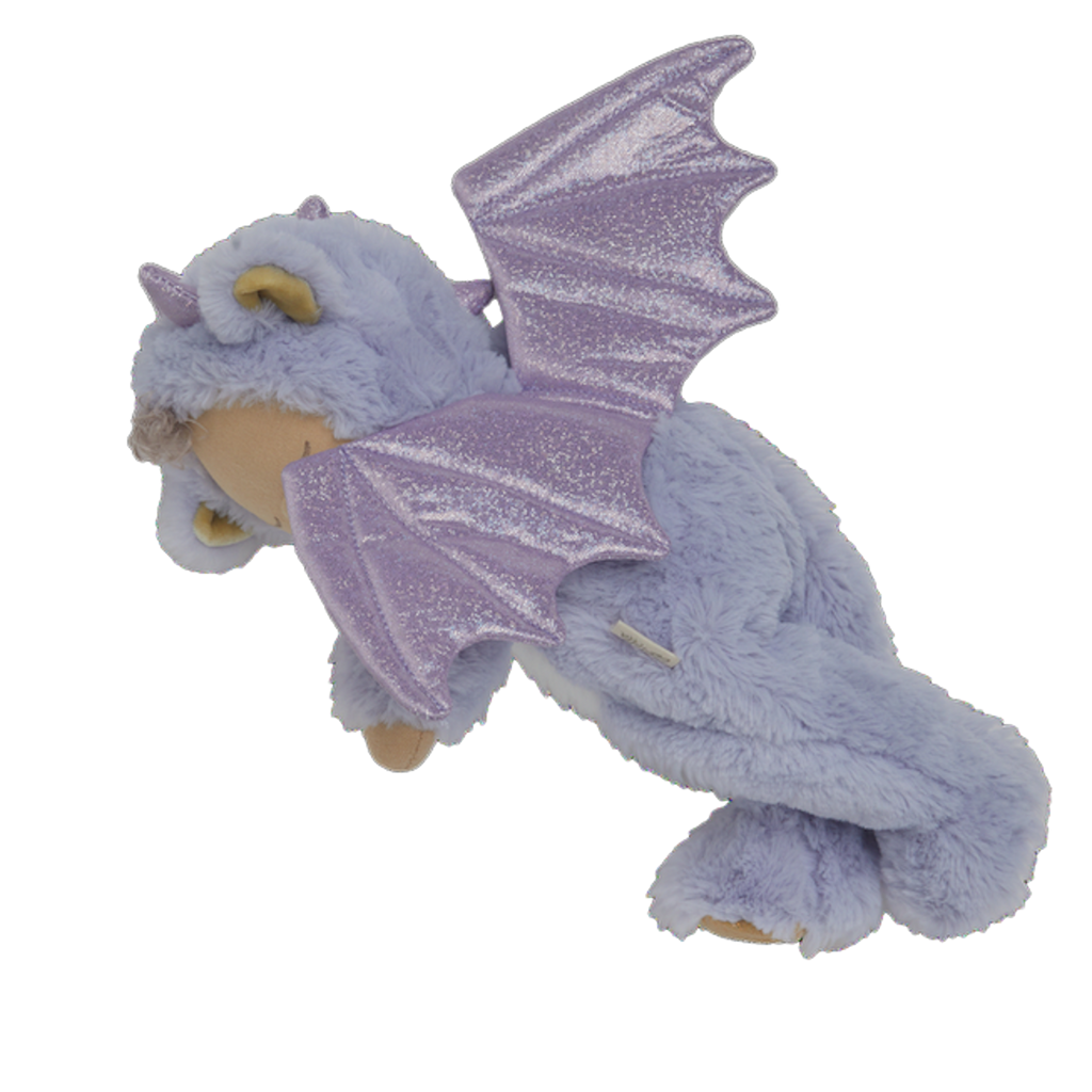 Cute plush doll in a purple dragon costume with sparkly wings. The doll has a serene expression, curly hair, and a small rainbow emblem.