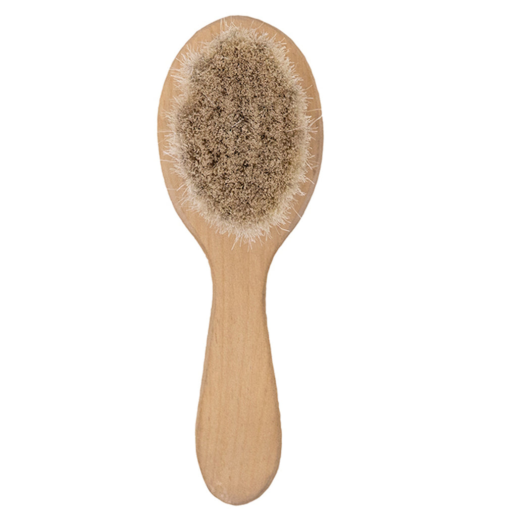 Wooden doll brush with soft, dense bristles, designed for dry brushing. The brush handle is smooth, giving a natural and rustic appearance.