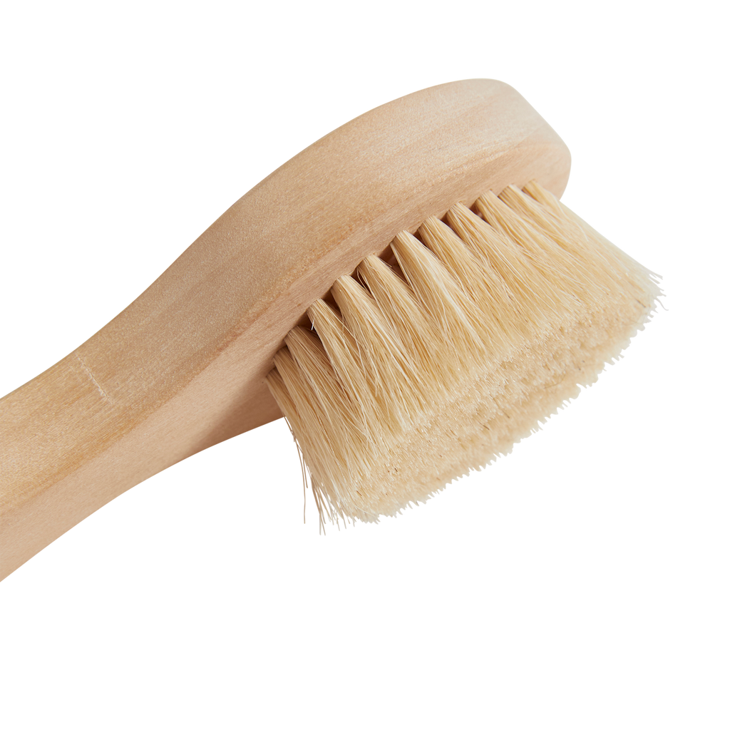 Wooden doll brush with soft, dense bristles, designed for dry brushing. The brush handle is smooth, giving a natural and rustic appearance.