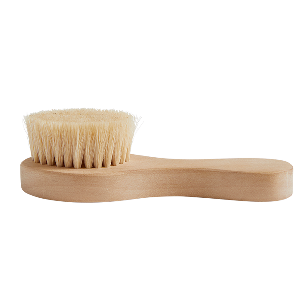 Wooden doll brush with soft, dense bristles, designed for dry brushing. The brush handle is smooth, giving a natural and rustic appearance.
