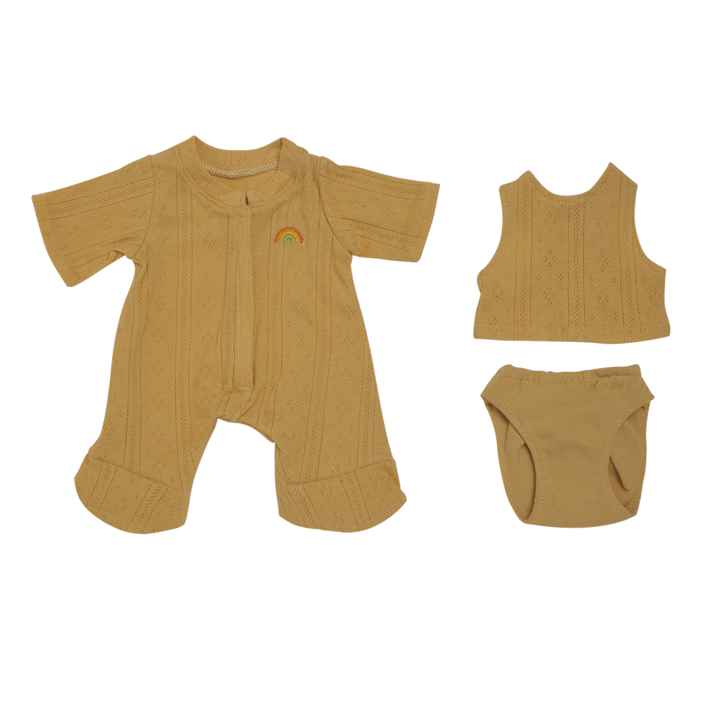 Yellow knitted doll outfit set on white background. Includes a one-piece suit with rainbow detail, a sleeveless top, and matching diaper cover. Cozy and cheerful.