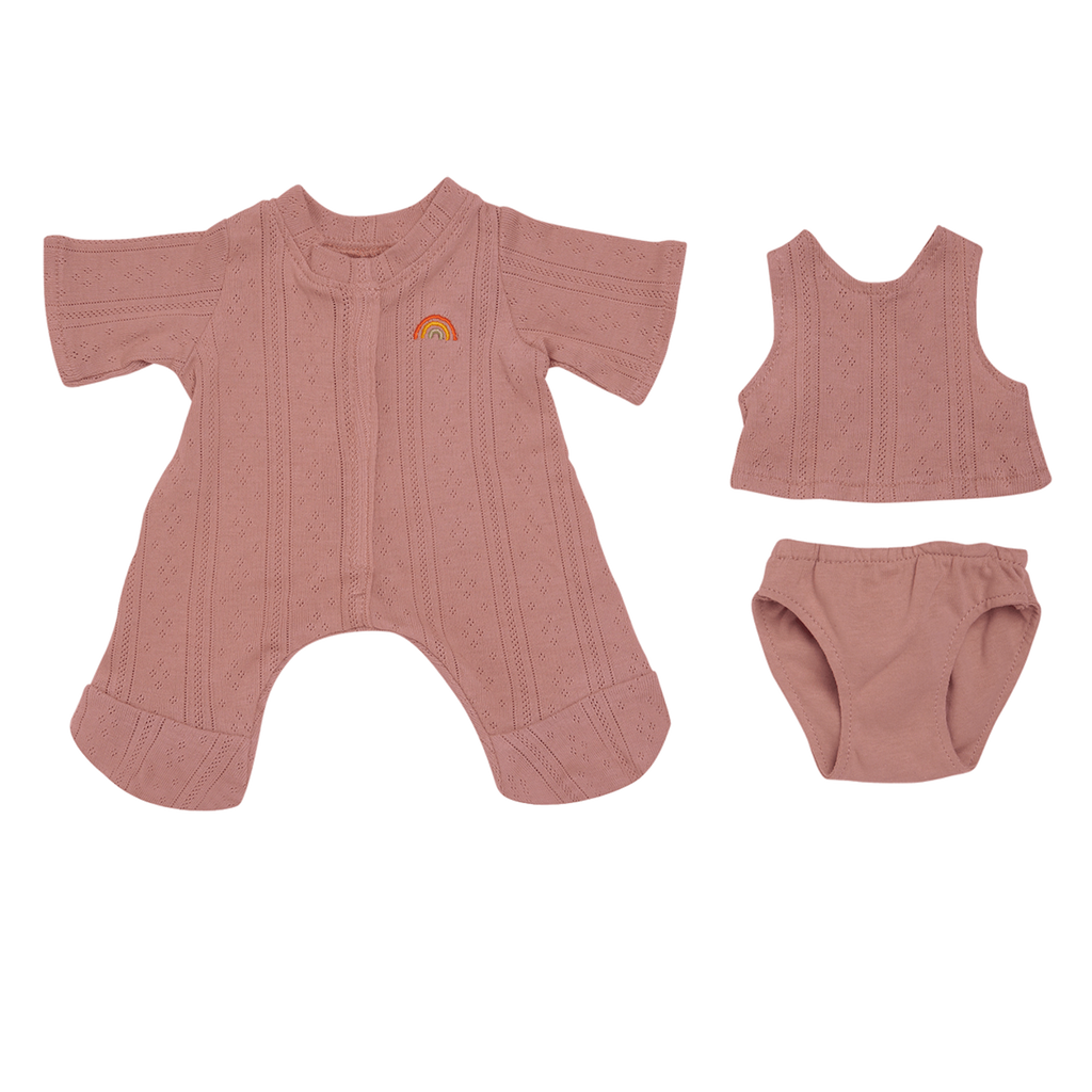Pink knit doll outfit set on white background, featuring a long-sleeve jumpsuit with rainbow embroidery, sleeveless top, and matching diaper cover.