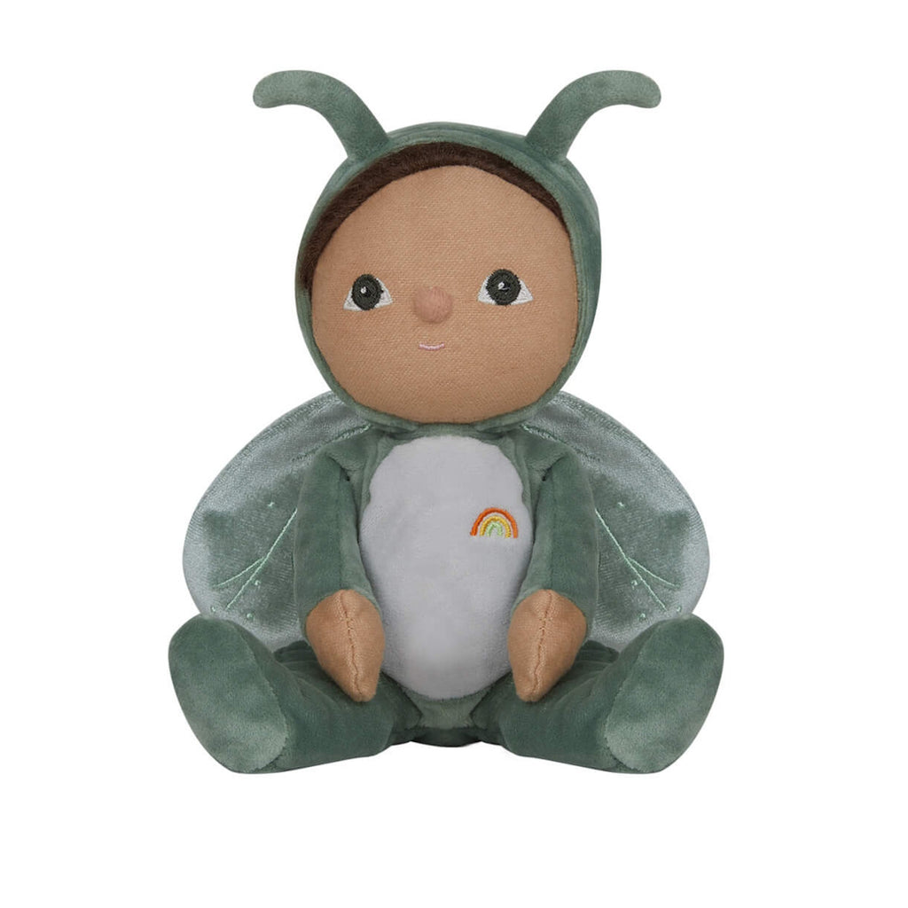 Cute plush doll in a green insect costume with wings and antennae, featuring a small rainbow on its belly. The doll has a gentle, cheerful expression.