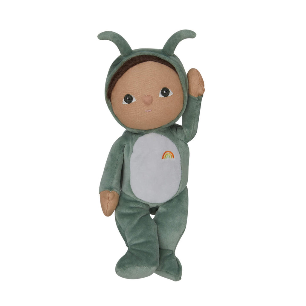 Plush doll in a green costume with antennae, smiling, one arm raised. Features include a rainbow on its stomach, creating a playful and cheerful tone.