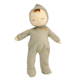 A soft, plush doll in a gray onesie with a small rainbow emblem. The doll has closed eyes and a serene expression, set against a white background.