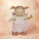 A doll with pigtails wears a pink star-patterned fairy dress, wings, and holds a gold heart wand. The doll has a cheerful expression.