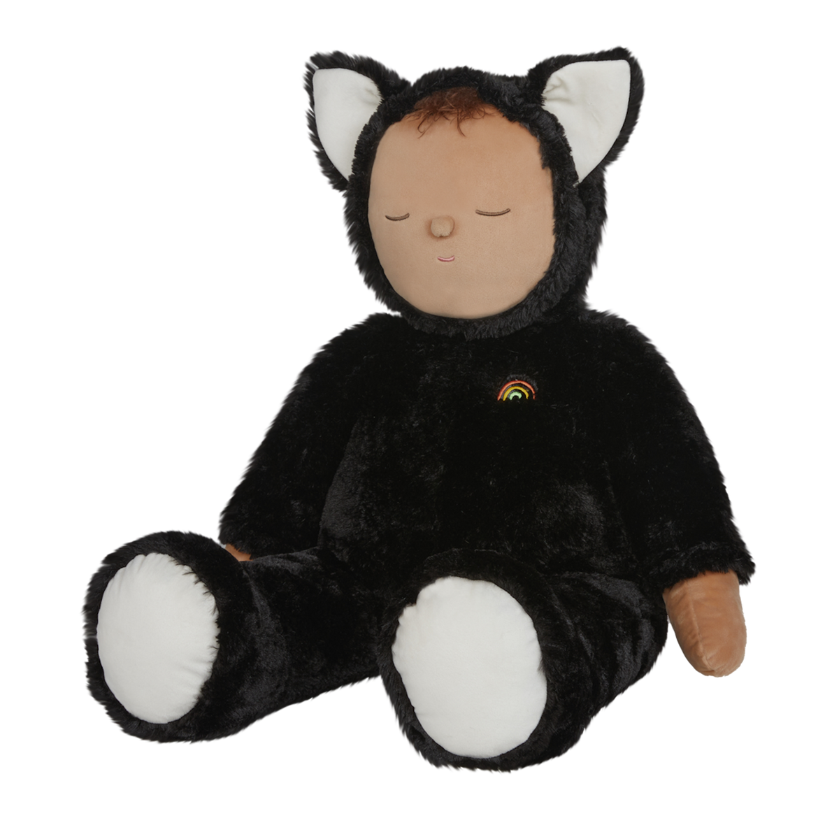 Plush doll dressed as a cat with black fur, white paws and ears, and a tiny rainbow on its chest. The doll's eyes are closed, creating a peaceful expression.