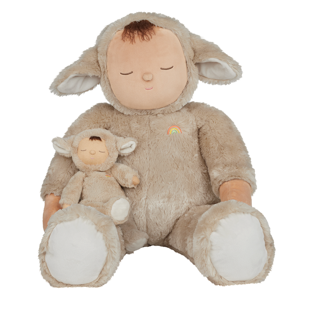 Cute plush doll in a fuzzy brown lamb suit with closed eyes, a peaceful expression, and a small rainbow emblem on its chest. Simple and cozy design.