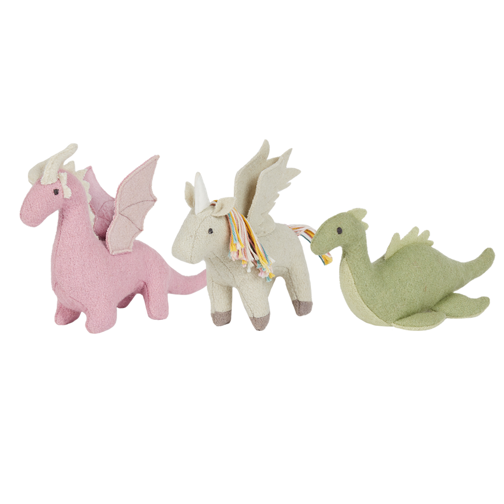 Three whimsical plush toys: a pink dragon, a beige unicorn with colorful mane, and a green dinosaur, each with wings, conveying a playful tone.