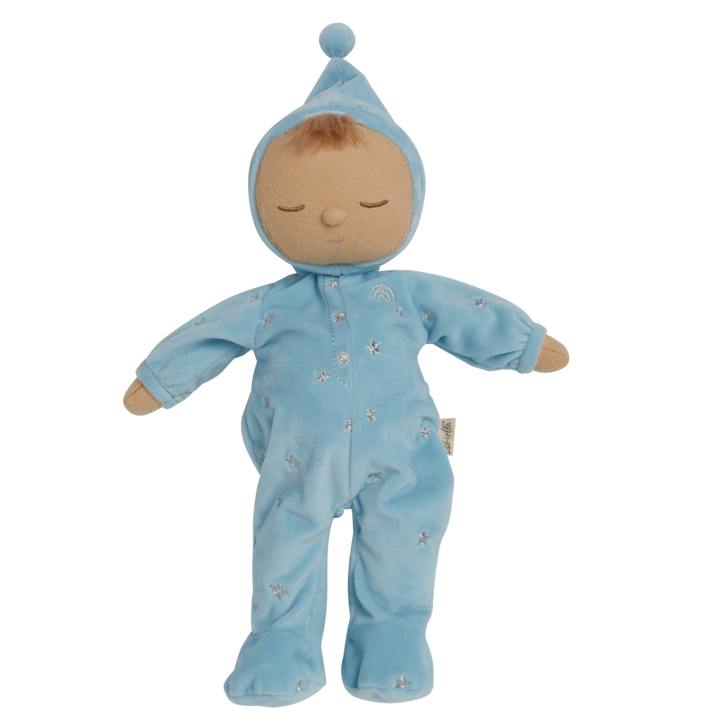 Soft plush doll dressed in a light blue outfit with a pointy hat, embroidered stars, and closed eyes, conveying a peaceful, sleepy tone.