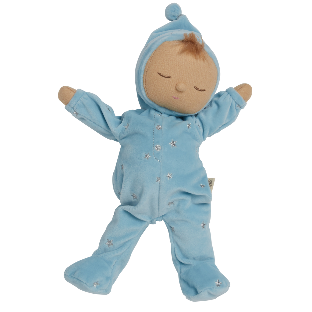 Soft plush doll dressed in a light blue outfit with a pointy hat, embroidered stars, and closed eyes, conveying a peaceful, sleepy tone.
