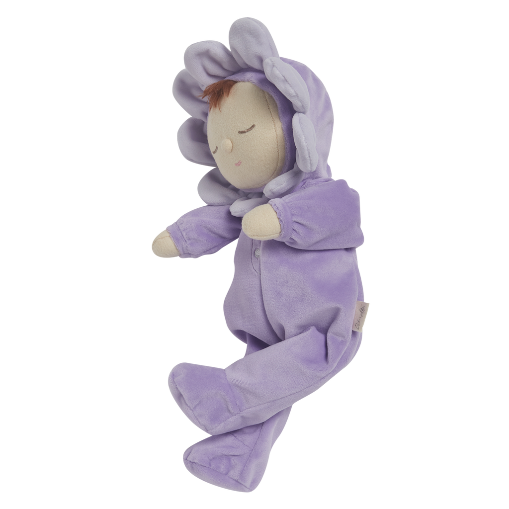 Plush doll with a serene face, dressed in a lavender flower costume, featuring petals around its head, creating a cute and calming tone against a white background.