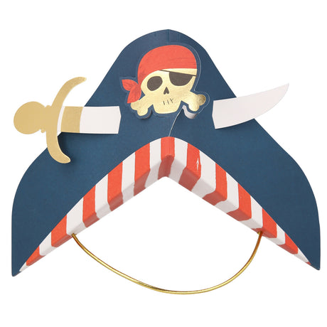 Blue paper pirate party hat with a skull, crossbones, a gold sword, and red and white striped brim.
