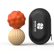 Two textured sensory balls stacked next to a black oval zippered case printed with "NEURO WIZ."