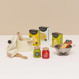 Wooden play food pasta set with cooking pot, colander, sauce jars, and pasta boxes.