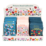 Nature Seed Collection display box with colorful seed packets for bees, butterflies, and ladybirds featuring floral designs.