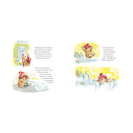 Illustrations of Paddington Bear making a mess in a bathroom, from an open 60th-anniversary edition book.