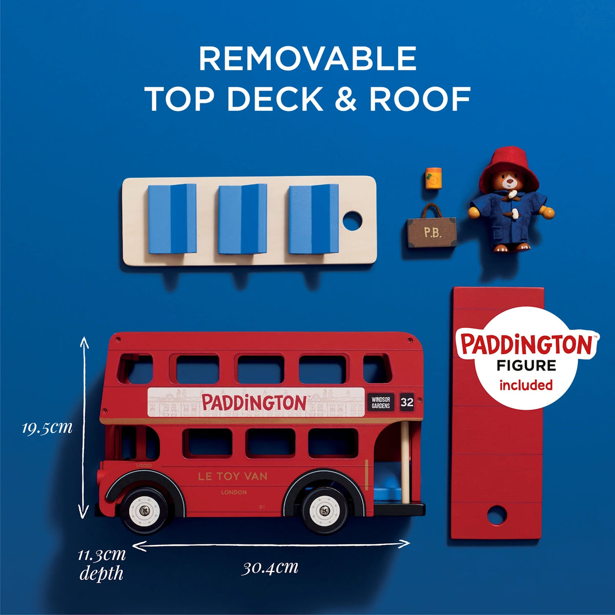 Wooden red London bus toy with removable top deck, roof, Paddington figure, suitcase, and dimensions shown.