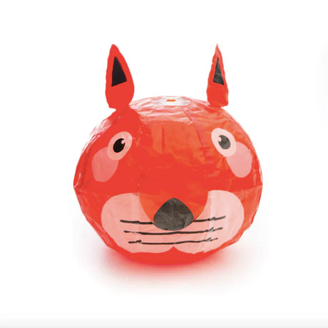 A vibrant orange paper lantern shaped like a fox's head with pointy ears, wide eyes, and a cute expression. The design is colorful and playful.