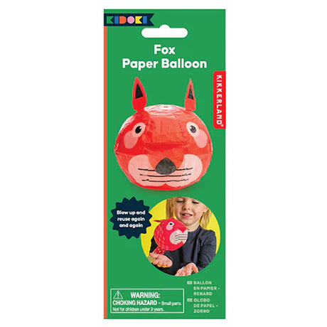 Green packaging for "Fox Paper Balloon" by Kikkerland. Features an orange fox face balloon with instructions to blow up and reuse. Warning about choking hazard.