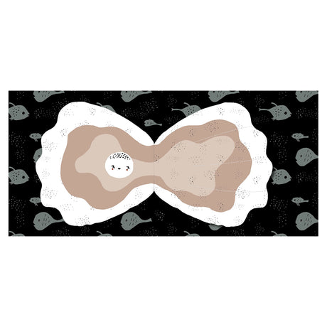 Baby cloth book spread showing an open oyster with a cute pearl inside, surrounded by grey fish on a black background.