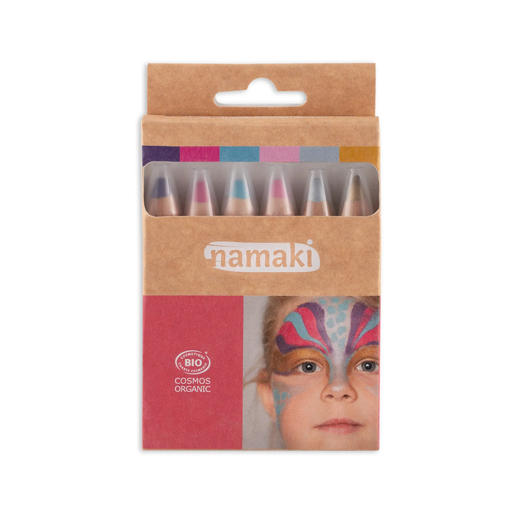 Namaki set of six organic face painting pencils in cardboard packaging, featuring a child with vibrant butterfly face paint.