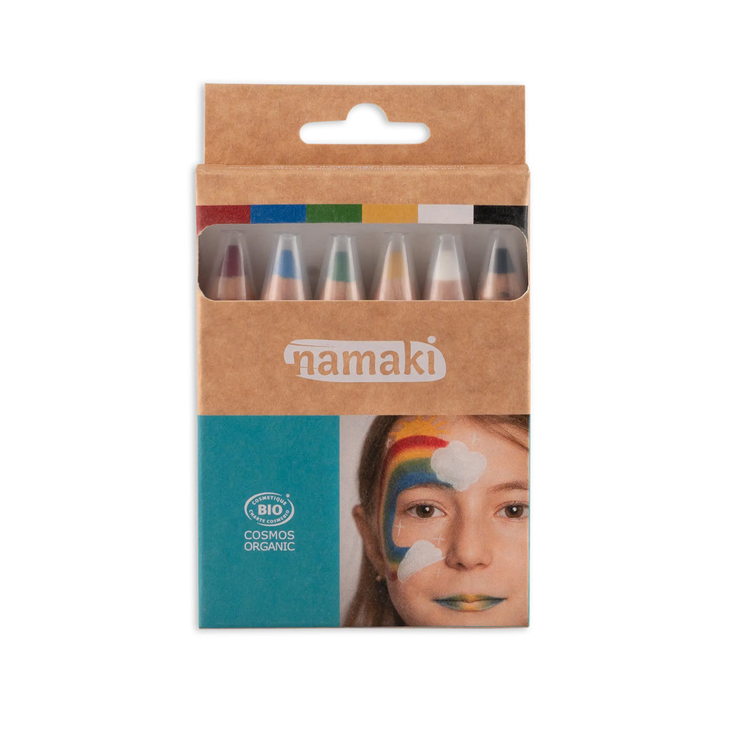 Namaki face paint pencil set in eco-friendly cardboard packaging, featuring six vibrant colours and a child with a rainbow face paint design.