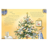 A rabbit in a blue coat stands beside a festive Christmas tree adorned with candles, bows, and ornaments. Cozy, illustrated scene with a warm, nostalgic feel.